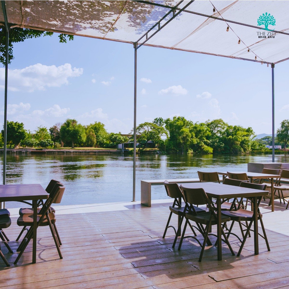 Riverside tables at the hotel café